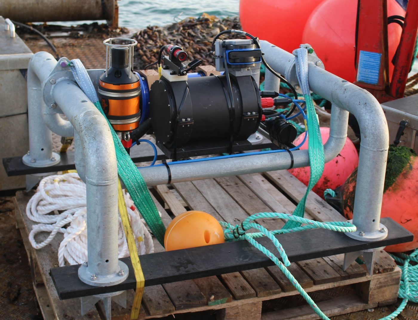 Ecodetect seabed lander with camera, sonar and sensors on a vessel deck