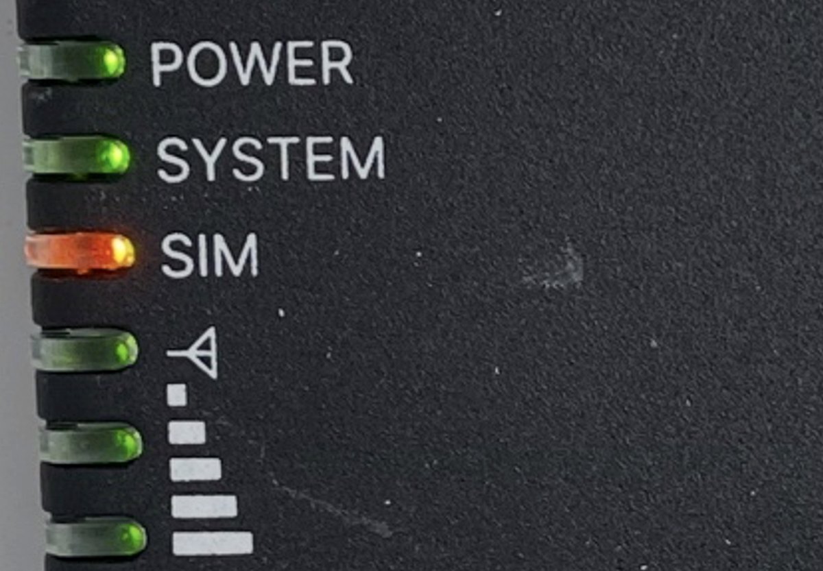Status lights on a cellular router: power, system, SIM and signal strength